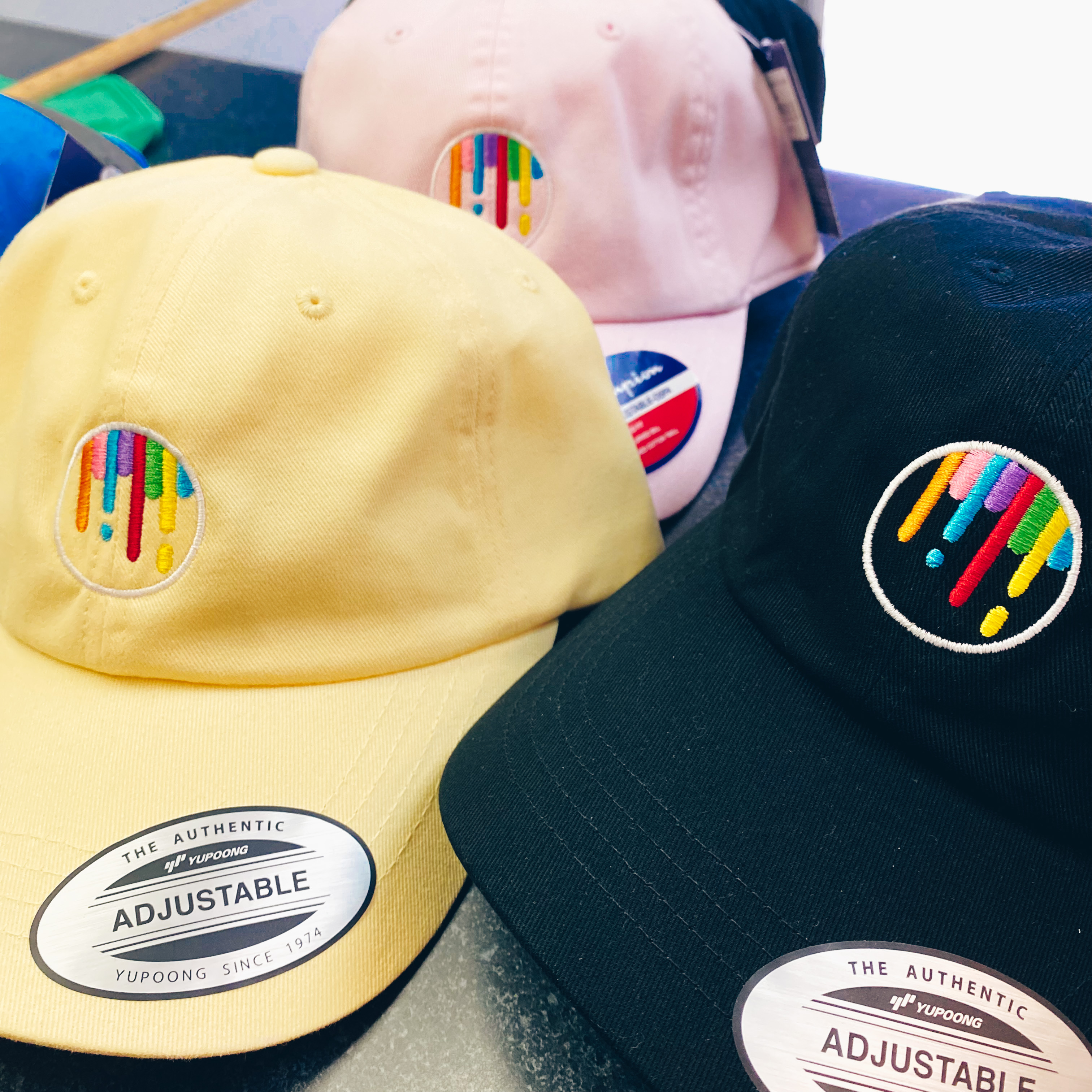 Embroidered hats with colorful logos
